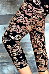 black cropped leggings with a damask print