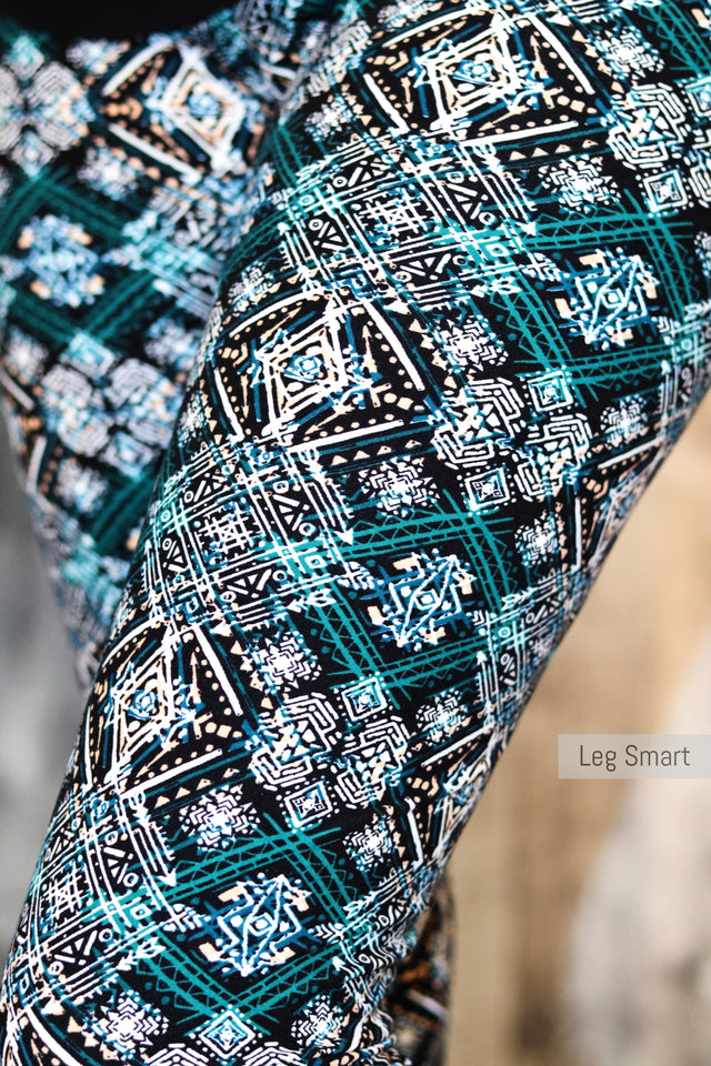 black capri leggings with a blueish-green and white print