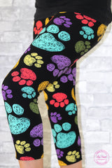 black capri leggings with colourful paw prints