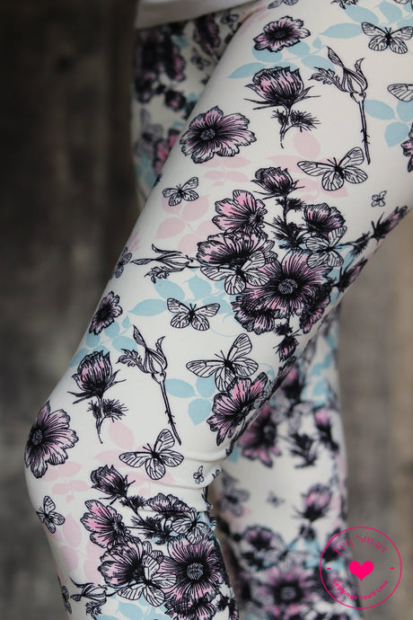 white capri leggings with butterflies and flowers